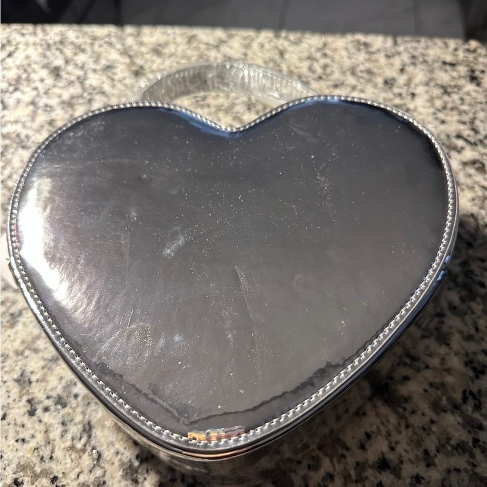 Silver Shoulder Bag with Decorative Stitching